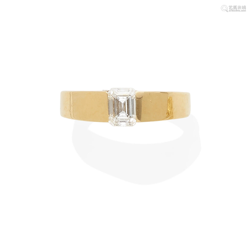 a gold and diamond solitaire ring