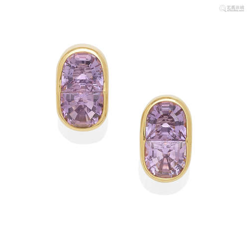 A pair of gold and amethyst ear clips