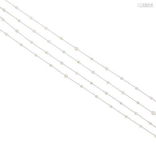 a white gold and diamond longchain necklace