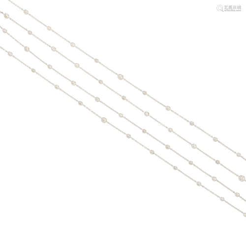 a white gold and diamond longchain necklace