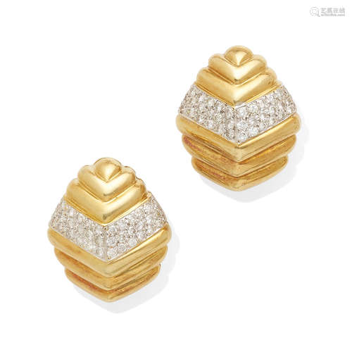 A pair of gold and diamond ear clips