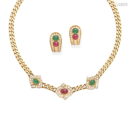 a gold, diamond, ruby and emerald necklace with ear clips