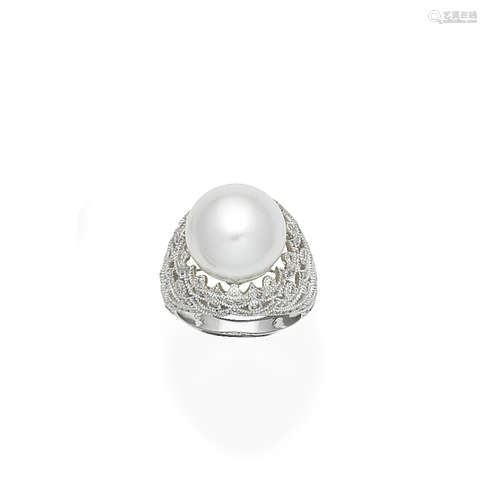 A cultured pearl and diamond ring