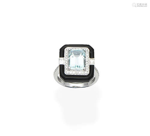 An aquamarine, onyx and diamond dress ring