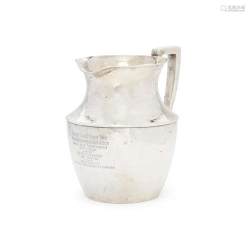 An American hand-hammered sterling silver pitcher  by Shreve & Co., San Francisco, CA, 20th century