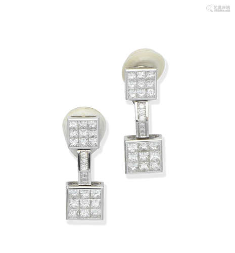 A pair of diamond pendent earclips, by Mouawad