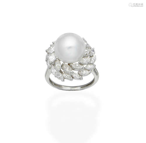 A cultured pearl and diamond cluster ring