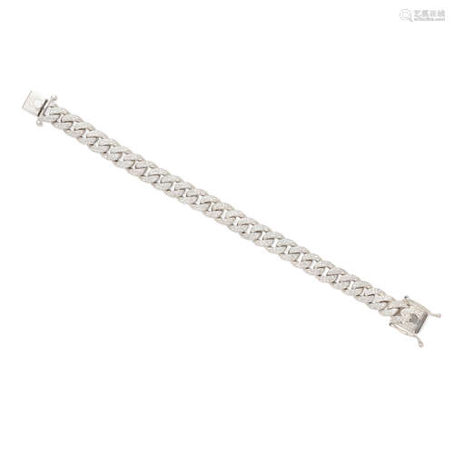 a white gold and diamond curb link bracelet