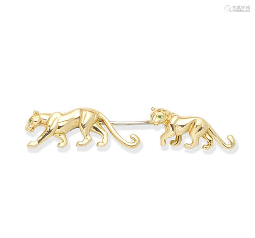 A gold jabot pin, by Cartier