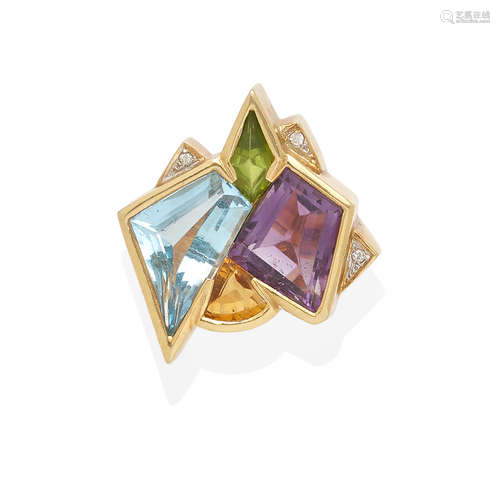 A gemstone and diamond ring