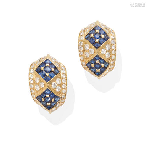 a pair of gold, blue sapphire and diamond ear clips