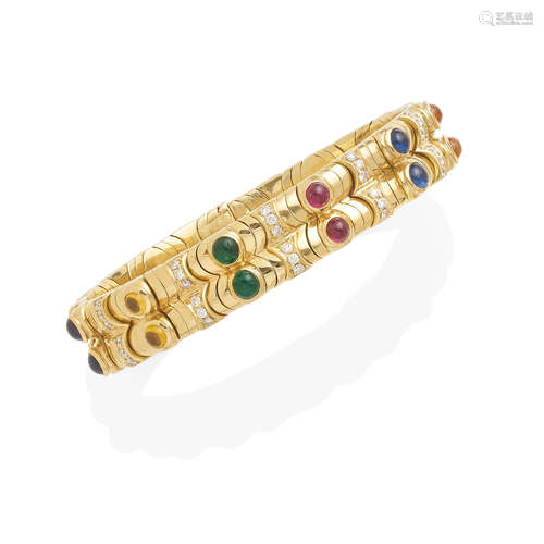 A gold, diamond and colored stone bracelet