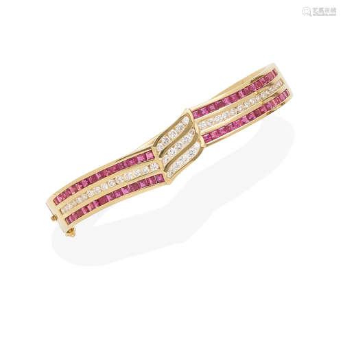 a gold, diamond and ruby hinged bangle