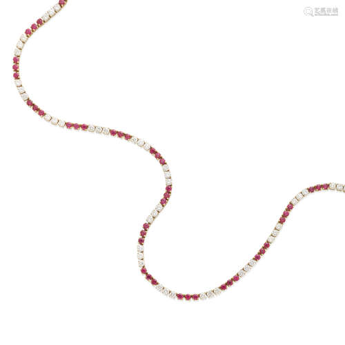 A gold, ruby and diamond line necklace