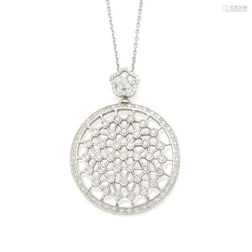 A diamond and white gold circle pendant