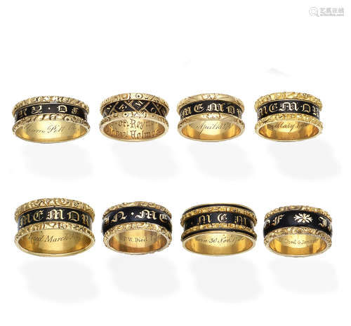 A collection of enamel mourning rings, circa 1820-1830   (8)