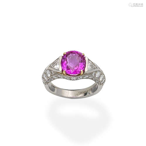 A pink sapphire and diamond ring