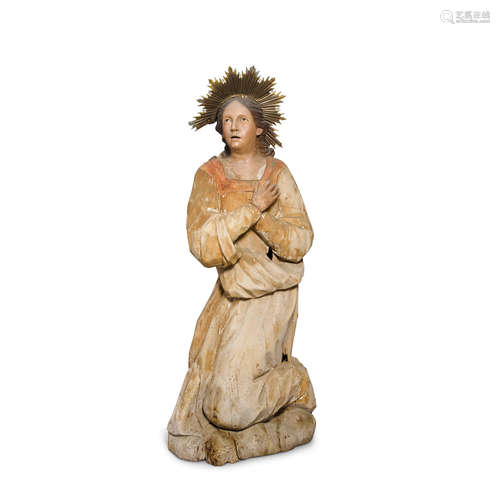 A Polychromed Carved Wood Figure Of A Kneeling Angel Possibly Mexican, circa 1800