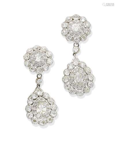 A pair of diamond pendent earrings