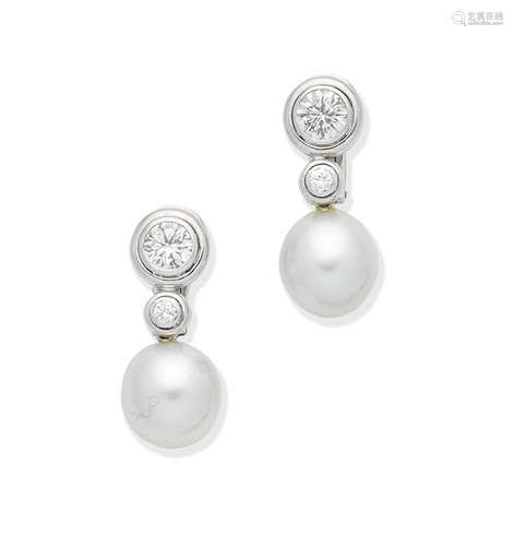 A pair of cultured pearl and diamond earrings