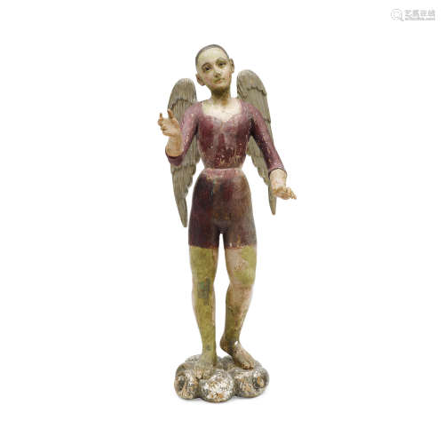 A Polychromed Carved Wood Figure of an Archangel  Central American, circa 1825