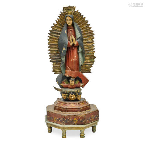 A Polychromed Carved Wood and Cloth Figure Of La Virgen De Guadalupe Probably Mexican, circa 1850