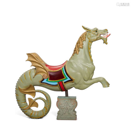 A Polychromed Carved Wood Carousel Sea Monster with Wing Saddle Daniel Muller, early 20th century