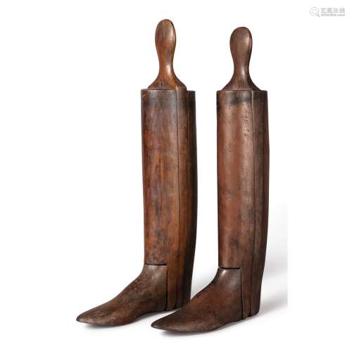 A PAIR OF STAINED WOOD BOOT STOPPERS, LATE 19TH CENTURY