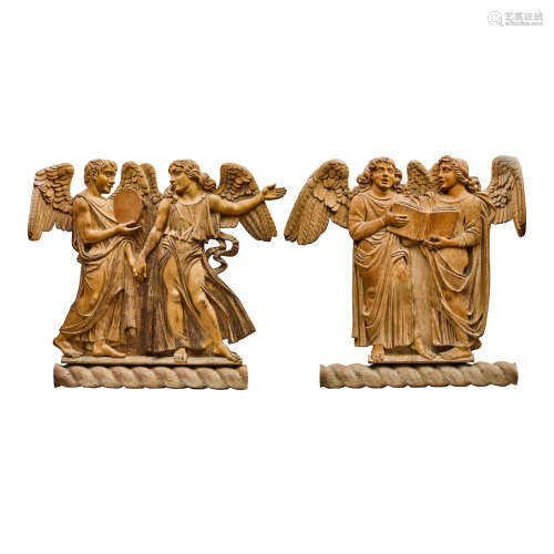 A Pair of Carved Oak Relief Panels Depicting Angels Making Music  Probably English, 19th century
