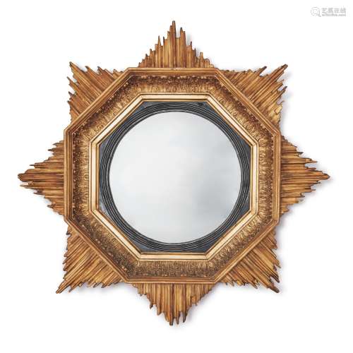 A REGENCY GILT AND EBONISED WOOD STARBURST CONVEX MIRROR, EARLY 19TH CENTURY