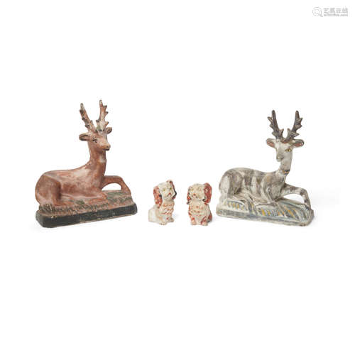 Two Painted Chalkware Figures of Recumbent Deer and Two Painted Chalkware Figures of Spaniel Dogs  Early 19th century