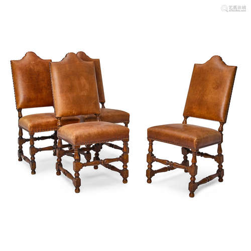 A Set of Four Baroque Style Leather Upholstered Oak Chairs  20th century