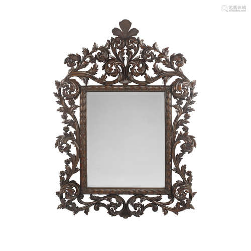 A Baroque Style Carved Walnut Mirror