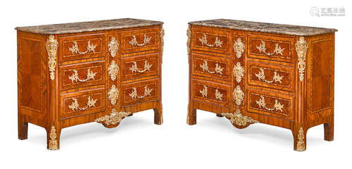 A Pair of Régence style Marble Top Gilt Bronze Mounted Kingwood and Mahogany Commodes  20th century