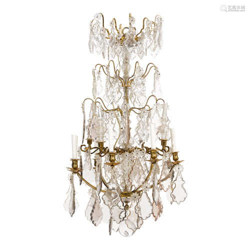 A Louis XV Style Bronze and Glass Eight Light Chandelier  Late 19th/early 20th century