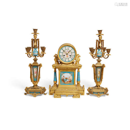 An Assembled Sèvres Style Gilt Bronze Mounted 'Jeweled' Porcelain Three Piece Clock Garniture  Late 19th century