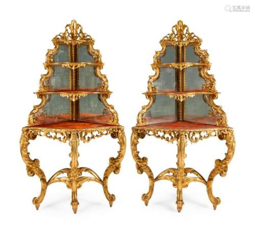 A Pair of French Giltwood Corner Etageres