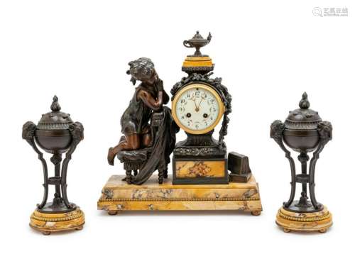A French Patinated Bronze and Marble Three-Piece Clock