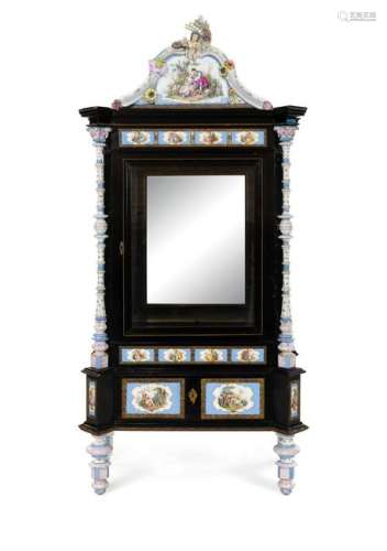 A Meissen Porcelain Mounted Ebonized Vitrine Cabinet