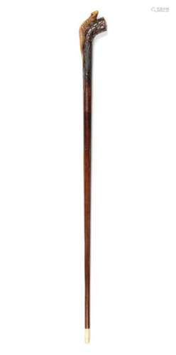 A Carved Wood Zoomorphic Walking Stick