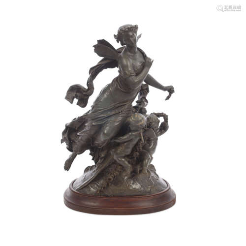 A Patinated Bronze Figural Group of a Fairy and Two Cupids  19th century