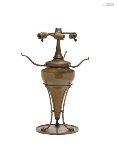 A Tiffany Studios patinated bronze lamp base  1899-1919Impressed TIFFANY STUDIOS NEW YORK 7810height 22 1/2in (57.1cm); diameter 9 1/2in (24.1cm)