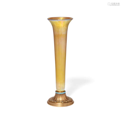 A Tiffany Studios Favrile Glass and Enameled Bronze Trumpet Vase  Early 20th centuryStamped Louis C. Tiffany Furnaces.Inc. 156 with firm's mark.height 17 1/4in (43.8cm)