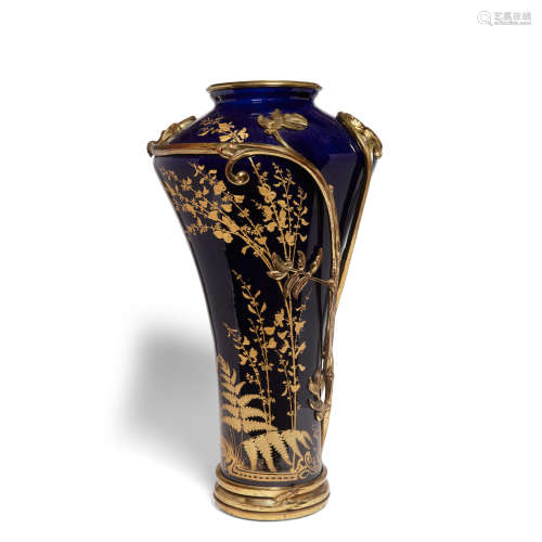 An Art Nouveau Gilt Bronze Mounted Gilt Decorated Porcelain Vase  circa 1900