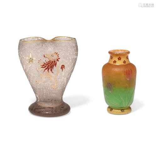 A DAUM FRÈRES ACID-ETCHED, ENAMELED AND GILT-DECORATED GLASS VASE  circa 1900Etched Daum Nancy, together with a Daum Frères acid-etched, enameled, and mottled and gilt decorated tulip glass vase, signed with the Cross of Lorraine.height 3 1/2 and 4 1/2in (8.8 and 11.2cm) (2)