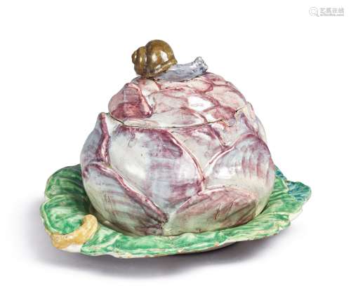 A CONTINENTAL FAIENCE RED-CABBAGE TUREEN AND COVER ON FIXED STAND, LATE 18TH CENTURY