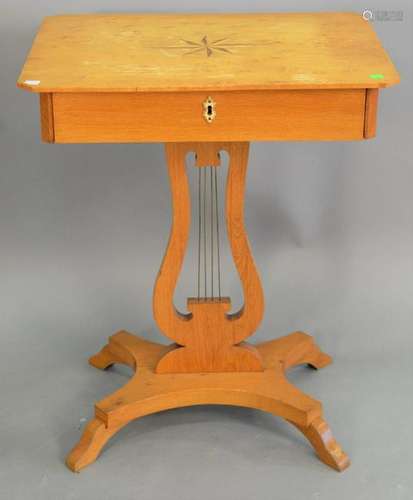 Biedermeier birch work table, having star inlaid top