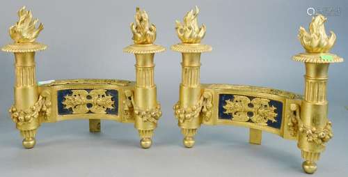 Pair of French bronze dore chenets having framing and