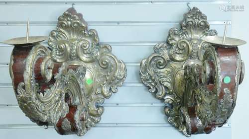 Pair of large candle sconces, having embossed silver