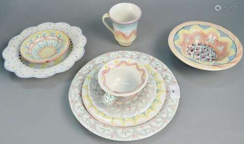 Sixty-three piece Mackenzie childs dinnerware set, to